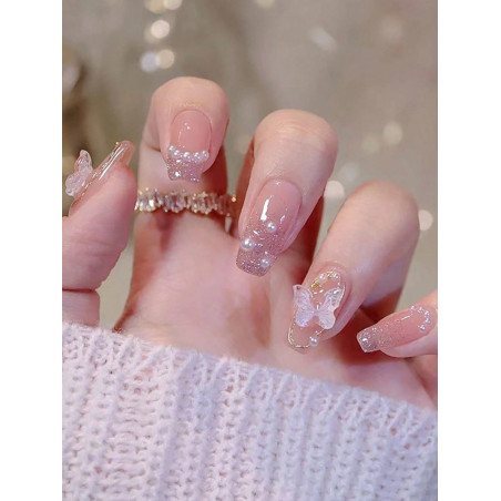 Mettez à jour votre look avec 24 pièces d'ongles faux élégants et simples de style de ballet de longueur moyenne- longue. Couleur rose glacée, ornés d la danse et les faux ongles à pression pour un usage quotidien. - 23734468