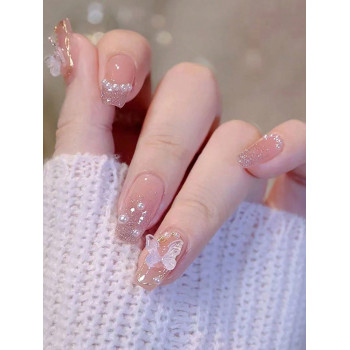 Mettez à jour votre look avec 24 pièces d'ongles faux élégants et simples de style de ballet de longueur moyenne- longue. Couleur rose glacée, ornés d la danse et les faux ongles à pression pour un usage quotidien. - 23734468